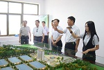 携手发展绿色建筑 中铁建设集团领导到晨阳水漆参观