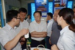 张家口银行总行董事长梅爱斌带队到晨阳水漆参观交流