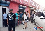 南关街道石油路社区联合多部门进行“喷涂围城”整治
